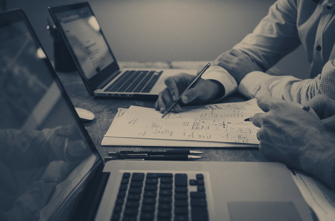 Consultants reviewing a client's figures